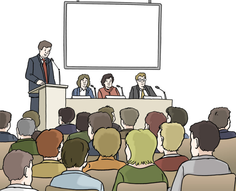 Symbolbild Politik mit einer Person am Rednerpult, drei Personen auf dem Podium und vielen Personen im Raum